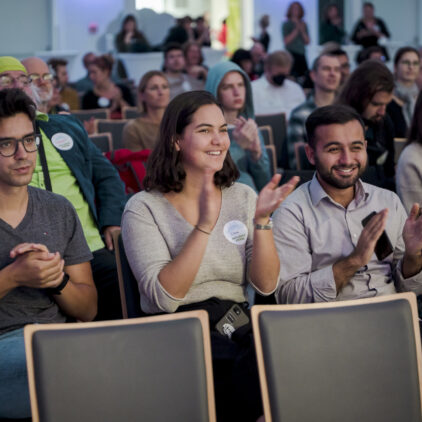 Foto des klatschenden Publikums von Influence Vienna