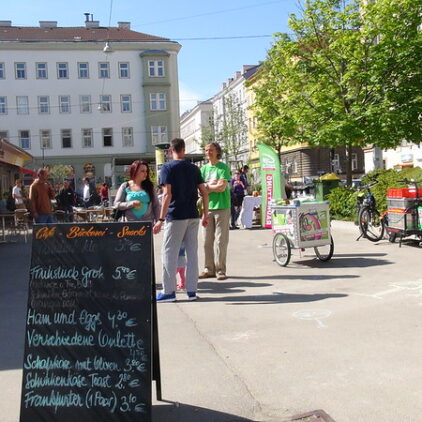 Foto einer Grünen Radrettung bei einem Markt